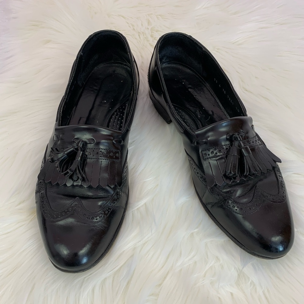 Johnston & Murphy Black Vedano Wing-tip Loafers